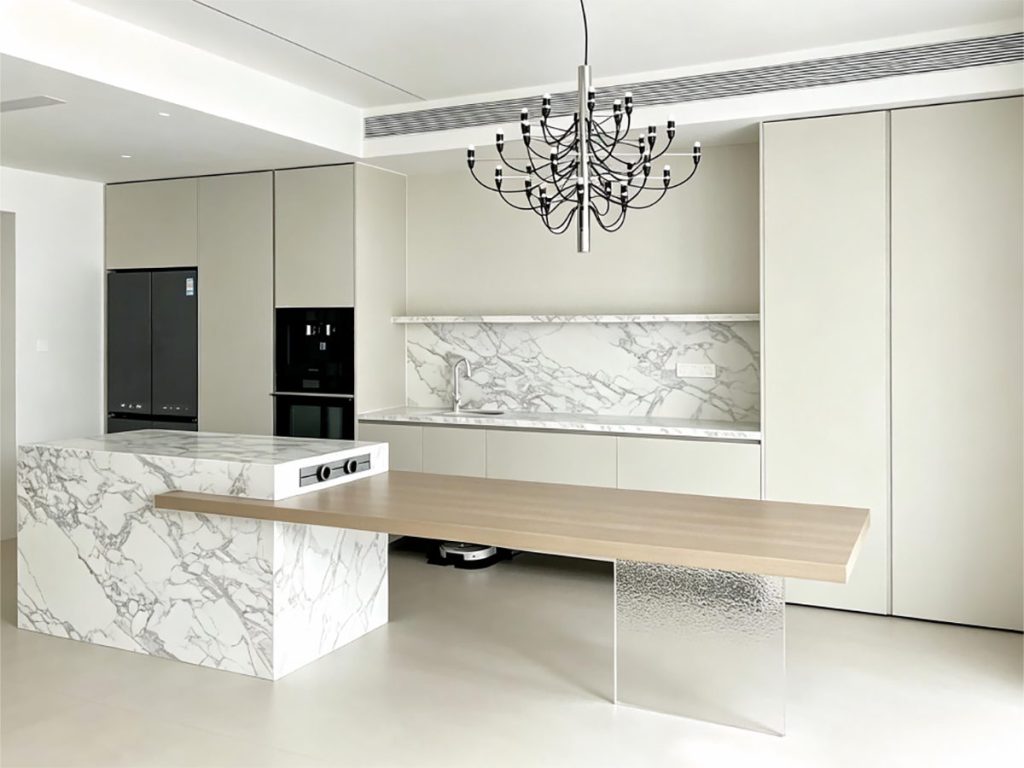 Italian Minimalist Marble Kitchen Island with Attached Oak Dining Table | Custom Integrated Kitchen Cabinets